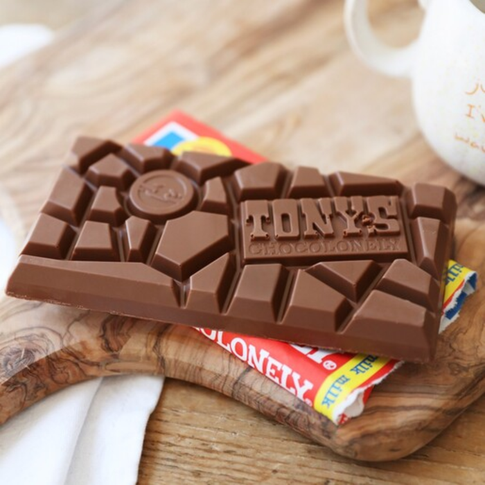 Tony's Chocolonely chocolate bar in its unevenly divided chunks