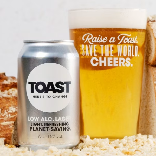 Can of Toast low alcohol beer with full glass