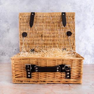 Sixteen inch wicker hamper handwoven from steamed willow