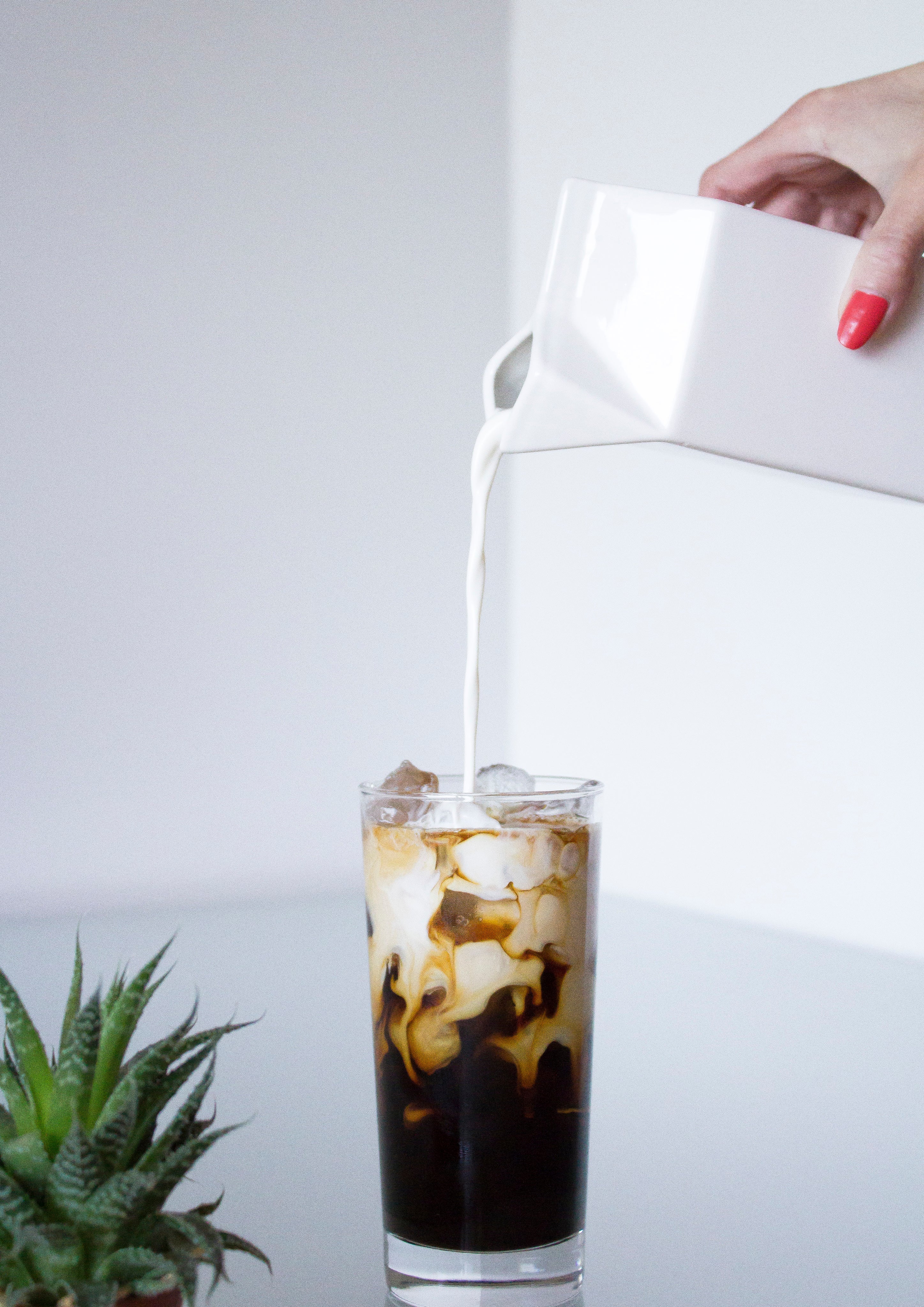 milk-swirling-as-poured-in-coffee